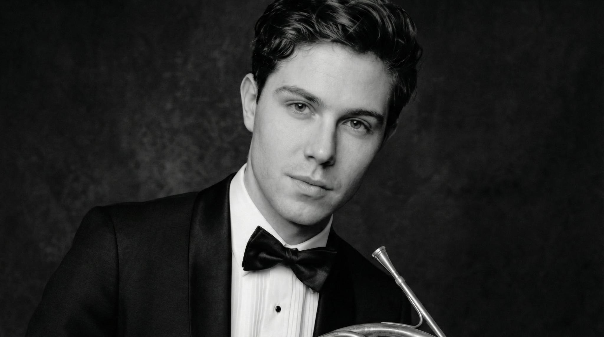 Close black and white tuxedo portrait with horn